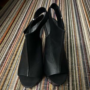 Multi color and black leather wedges.